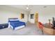 Spacious bedroom featuring high ceilings, an ensuite bathroom and bright natural light at 3388 Highlands Bridge Rd, Sarasota, FL 34235