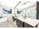 The luxurious bathroom offers a walk-in shower with glass door, a soaking tub, and double sinks at 340 Jackson Dr, Sarasota, FL 34236