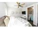 Cozy bedroom offering a modern design, natural light, and connecting en-suite bathroom at 340 Jackson Dr, Sarasota, FL 34236