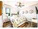 Cozy bedroom offering a modern design, natural light, and beautiful outdoor scenery at 340 Jackson Dr, Sarasota, FL 34236