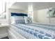 A close up view of the bunk beds with blue patterned bedding and starfish pillows at 340 Jackson Dr, Sarasota, FL 34236
