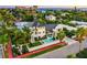 Stunning two-story home with modern design, private pool, and lush landscaping near the beach at 340 Jackson Dr, Sarasota, FL 34236