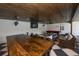 Spacious game room with a pool table, TV, and large wooden table, perfect for entertaining at 340 Jackson Dr, Sarasota, FL 34236