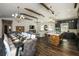 Open layout featuring a dining area, living room, and kitchen with modern appliances and finishes at 340 Jackson Dr, Sarasota, FL 34236