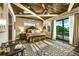 Spacious bedroom featuring wood ceiling, ensuite closet and outdoor patio at 340 Jackson Dr, Sarasota, FL 34236