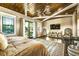 Spacious bedroom featuring wood ceiling, seating area and outdoor patio at 340 Jackson Dr, Sarasota, FL 34236