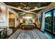 Spacious bedroom featuring wood ceiling, ensuite closet and outdoor patio at 340 Jackson Dr, Sarasota, FL 34236