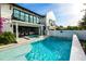 Backyard pool with a hot tub, perfect for entertaining and relaxing in style at 340 Jackson Dr, Sarasota, FL 34236