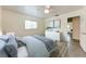 Bedroom featuring ceiling fan, clean white furniture and neat decor at 3707 Kingswood Dr, Sarasota, FL 34232