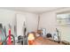 Unfinished basement with a window, random objects, and carpeting at 3921 Marlborough Pl, Sarasota, FL 34241