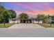 Charming single-story home with a spacious driveway and well-maintained landscaping at 3921 Marlborough Pl, Sarasota, FL 34241