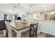 Bright dining area with wood table and stylish chairs open to the cozy living room and kitchen at 4061 Crockers Lake Blvd # 27, Sarasota, FL 34238