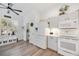 Bright kitchen has white cabinets and appliances, lots of counter space, and a coffee bar at 4307 Manfield Dr, Venice, FL 34293