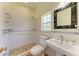 Bathroom with white tile, a shower, and a modern sink at 4647 Stone Ridge Trl, Sarasota, FL 34232