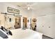 Bedroom with barn door to the bath and large closet, plus a comfortable queen bed at 4727 Sabal Key Dr # 4727, Bradenton, FL 34203