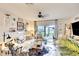 Inviting living room with comfortable seating, large windows, and stylish decor at 4727 Sabal Key Dr # 4727, Bradenton, FL 34203