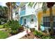 Charming townhouse with a beautifully decorated entryway and well-manicured landscaping at 4727 Sabal Key Dr # 4727, Bradenton, FL 34203