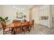Formal dining room with comfortable seating and a built-in wet bar at 4809 Benito Ct, Bradenton, FL 34211