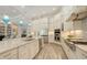 The eat-in kitchen boasts an island, stainless steel appliances, plenty of cabinet space, and granite countertops at 4809 Benito Ct, Bradenton, FL 34211