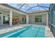 Beautiful pool area features a spa, covered patio, and a lovely outdoor space at 4809 Benito Ct, Bradenton, FL 34211