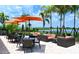 Outdoor patio seating with tables, chairs, and couches with an open view at 4809 Benito Ct, Bradenton, FL 34211