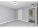 Bedroom featuring a modern chandelier and light blue walls giving the room a relaxing feel at 5266 Wagon Wheel Dr, North Port, FL 34291
