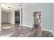 Bright, open-concept living room with luxury vinyl flooring and recessed lighting at 5266 Wagon Wheel Dr, North Port, FL 34291