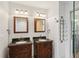 Bathroom featuring double sinks with dark wood cabinets and granite countertops at 532 Oak Hill Cir # 12, Sarasota, FL 34232