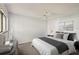 Comfortable bedroom with neutral decor, a ceiling fan, and ample natural light at 532 Oak Hill Cir # 12, Sarasota, FL 34232
