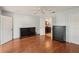 Large bedroom with wood floors, ceiling fan, and dark furnishings at 532 Oak Hill Cir # 12, Sarasota, FL 34232