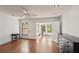 Open and airy bedroom with natural light, wood floors, and neutral decor at 532 Oak Hill Cir # 12, Sarasota, FL 34232