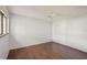 Empty bedroom featuring hardwood floors, a ceiling fan, and bright, natural light at 532 Oak Hill Cir # 12, Sarasota, FL 34232