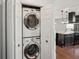 Conveniently placed stackable washer and dryer set in a closet, near the kitchen at 532 Oak Hill Cir # 12, Sarasota, FL 34232