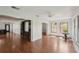 Spacious living room boasting hardwood floors and large windows with natural lighting at 532 Oak Hill Cir # 12, Sarasota, FL 34232