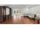 Spacious open-plan living room featuring hardwood floors and white walls at 532 Oak Hill Cir # 12, Sarasota, FL 34232