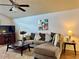 A close view of this living room featuring vaulted ceilings and a comfortable sofa at 5400 34Th W St # H12, Bradenton, FL 34210