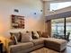 Living room featuring vaulted ceilings and sliding glass doors at 5400 34Th W St # H12, Bradenton, FL 34210
