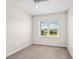 Bedroom with carpet, bright window, and neutral walls at 5709 Wild Sage Cir, Sarasota, FL 34238