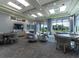 Spacious lounge area with modern decor, comfortable seating, and a relaxed atmosphere, ideal for gatherings and leisure at 5843 Wake Forest Run # 104, Bradenton, FL 34211
