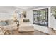 Comfortable living room with sliding glass doors to the porch, allowing natural light at 6501 Mourning Dove Dr # 215, Bradenton, FL 34210