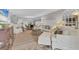 Open-concept living and dining area with modern furnishings and decor at 6501 Mourning Dove Dr # 215, Bradenton, FL 34210