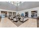Spacious lobby with soaring ceilings, comfortable seating, and contemporary design elements at 7136 Summerland Cv, Bradenton, FL 34202