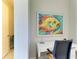 Corner of a study room features a fish picture on the wall and a white desk at 7136 Summerland Cv, Bradenton, FL 34202