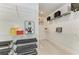 Walk-in closet with white wire shelving, providing ample storage space at 7136 Summerland Cv, Bradenton, FL 34202