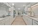 Well-equipped kitchen with stainless steel appliances, quartz countertops, and ample storage space at 7817 Alhambra Dr, Bradenton, FL 34209