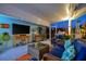 Outdoor seating and bar area featuring modern appliances and entertainment options at 7817 Alhambra Dr, Bradenton, FL 34209