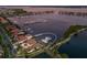 Aerial view of an estate home with a private boat dock and waterfront access to the intercoastal waterway at 801 3Rd E St, Palmetto, FL 34221