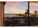 Covered balcony offering picturesque waterfront views and clear railings at 801 3Rd E St, Palmetto, FL 34221
