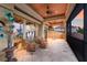 Spacious covered balcony with comfortable seating and lovely outdoor views at 801 3Rd E St, Palmetto, FL 34221