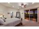 Bedroom with a view of a large balcony and sunset at 801 3Rd E St, Palmetto, FL 34221